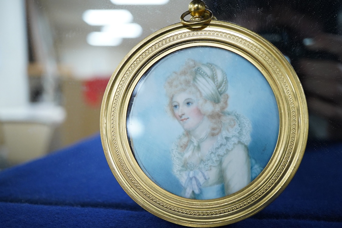 Late 19th / early 20th century School, indistinctly signed T Roche?, Portrait miniature of a lady, possibly Mozart's wife, tondo watercolour on ivory, housed in a gilt frame, overall 10cm diameter CITES Submission refere